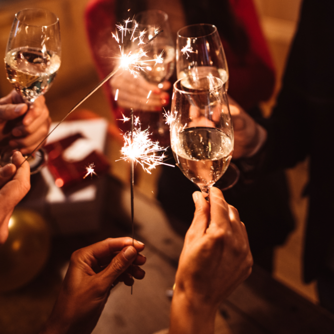 Champagne glasses and a sparkler